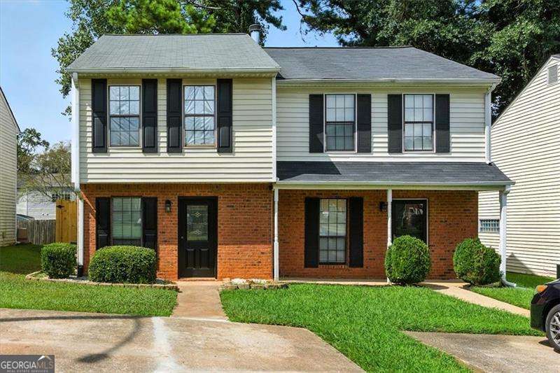 Welcome to this stunning renovated, and FULLY FURNISHED, townhouse in the heart of Smyrna. A 2-bedroom, 2.5-bathroom townhouse offers a roommate-friendly floor plan, with each bedroom featuring its own private full bath. The main level includes a convenient half bath, spacious living area, and a fully stocked kitchen.Minutes from the heart of Smyrna Market Village, home to farmers markets, boutique shopping, and an array of dining options like Ruby's Sourdough Pizza, Mezza Luna, StillFire Brewing, and Rev Coffee. Plus, you're less than 10 minutes from Truist Park, home of the Atlanta Braves. Additional features include: Two dedicated parking spots, outdoor storage, and a fenced in backyard. Fully furnished with all essentials-just bring your bags. Perfectly located and thoughtfully equipped, this home offers both comfort and convenience in one of Smyrna's most desirable areas.