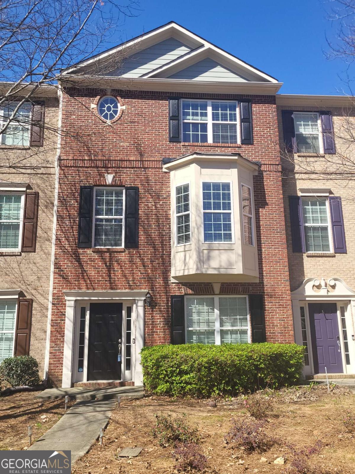 Step into comfort and style with this spacious 3-bedroom, 3.5bathroom townhouse, thoughtfully designed for both everyday living and entertaining. Featuring a brand-new HVAC system installed in 2023, you'll enjoy peace of mind and year-round comfort. The bright, open floor plan boasts a welcoming living area, a modern kitchen with ample counter space, and a dining area perfect for gatherings. Each bedroom offers its own private bath for ultimate convenience, while the half bath on the main level is ideal for guests. Enjoy the deck for relaxing, and an attached garage for easy parking. Conveniently located only 1 mile from Marietta Square with shopping & dining, this home offers the perfect blend of functionality, style, and location. Priced to sell! Don't miss the opportunity to make this move-in-ready home yours!
