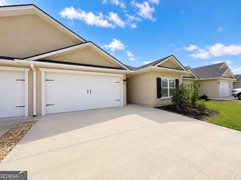 Photo of 152 The Villas Way, Kingsland, GA 31548 (MLS # 10839620)