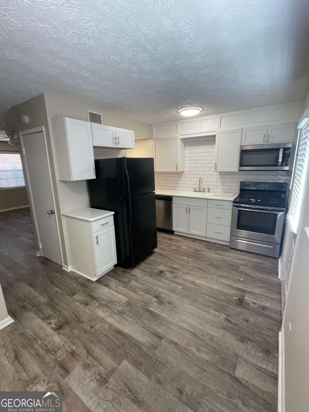 Photo of 1235 Riverside Drive #C1, Gainesville, GA 30501 (MLS # 10854429)