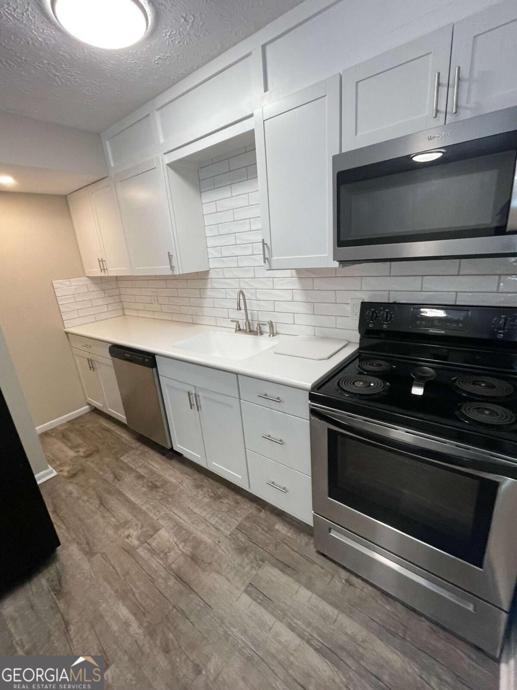 Photo of 1235 Riverside Drive #C1, Gainesville, GA 30501 (MLS # 10854429)