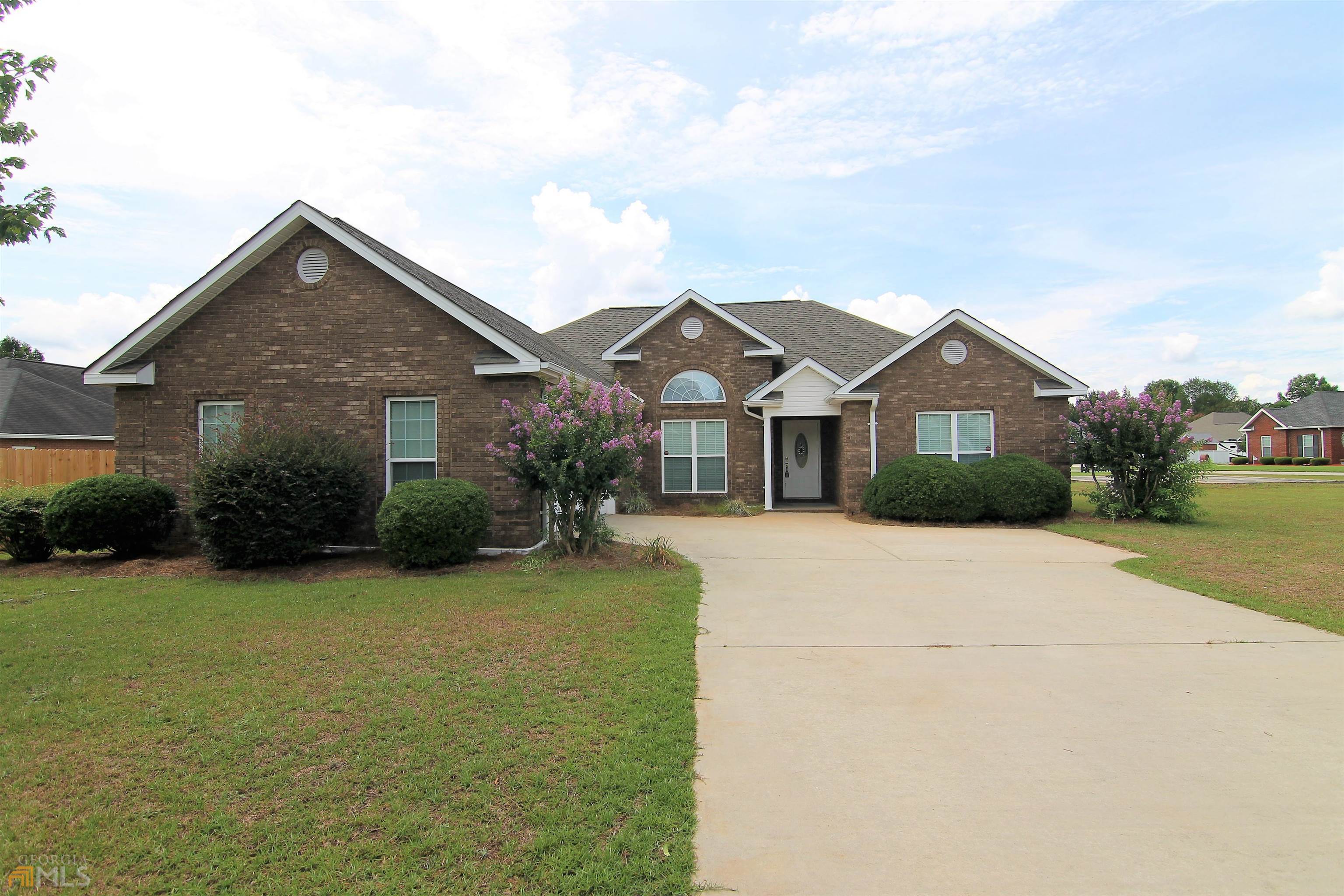 We know you've been looking, but now it's time to make your move! Swipe right to this lovely home in the Houston County High School zone! Located on a corner lot in the Pembroke subdivision, this home offers 3BR/2BA, a formal dining space and 2 car garage. The open floor plan is a match made in heaven and provides plenty of space to entertain your family and friends. Enjoy the dreamy cabinetry in the kitchen, complete with pantry, stainless appliances, breakfast bar and more! Your heart is sure to skip a beat when you see the massive laundry room with laundry tub. The Owner's Suite offers a roomy private bathroom with double vanity, whirlpool tub, separate shower and large walk-in closet. Additional bedrooms are split from the Owner's Suite for additional privacy. The covered back patio leads to an attached cement grilling pad that makes enjoying the back yard a breeze. This home is quite the catch, so don't let it be the one that got away. Call to schedule your date and check out this beauty today!