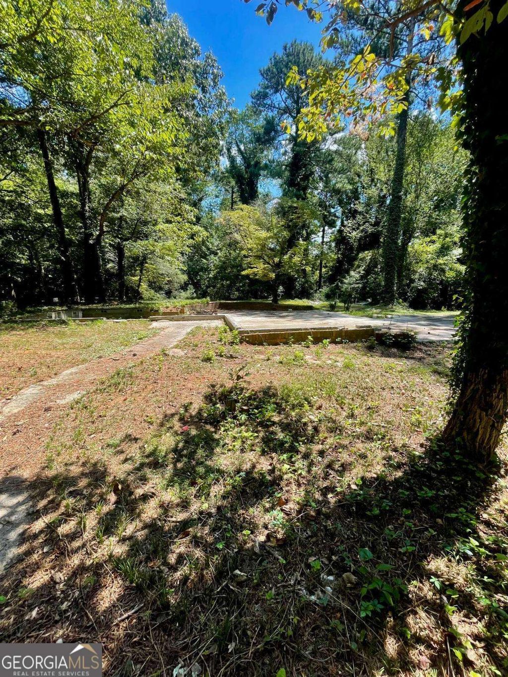 Photo of 504 Raven Springs Trail, Stone Mountain, GA 30087 (MLS # 10698737)