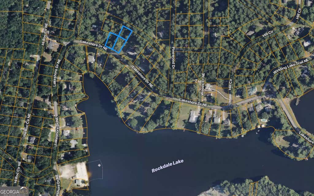 Photo of 2458 Lakeshore Drive NE, Conyers, GA 30012 (MLS # 10834592)
