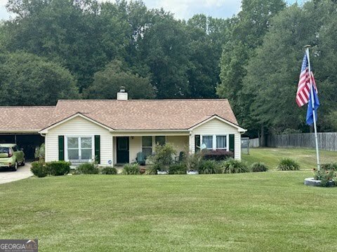 Welcome to this charming 3-bedroom, 2-bath ranch on a large, 2 acre level fenced lot in the heart of Auburn, GA. With no HOA, a new roof, newer HVAC system, and newer hot water heater, this move-in ready home offers peace of mind and freedom to make it your own. Home has two out buildings on 12x20 and the other one is 20x20. Inside, you'll find split bedroom floor plan, family room with fireplace, a well appointed kitchen, outdoor covered space, solid flooring throughout home. The seller is also including tile for the bedrooms, ready for installation after move-out to enhance the home's appeal even further. This is the perfect one floor living! Set in Auburn, one of the fastest-growing communities in Northeast Georgia, this home is more than just a property-it's a lifestyle. Auburn has seen tremendous growth in recent years, with new families, businesses, and amenities adding to its small-town charm. The city hosts year-round community events and offers multiple parks such as Shackelford Park and Wildflower Park, as well as ballfields and walking trails for recreation. Its close-knit atmosphere blends perfectly with easy access to nearby Fort Yargo State Park and Little Mulberry Park, making it ideal for outdoor enthusiasts. With its rising property values, family-friendly vibe, and convenient location between Atlanta and Athens, Auburn is a thriving place to call home and an excellent long-term investment.