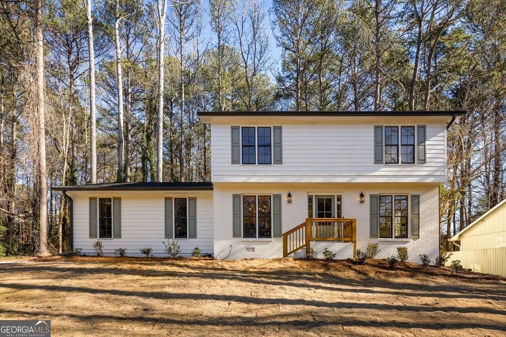 Photo of 1966 S Hidden Hills Parkway, Stone Mountain, GA 30088 (MLS # 10664985)