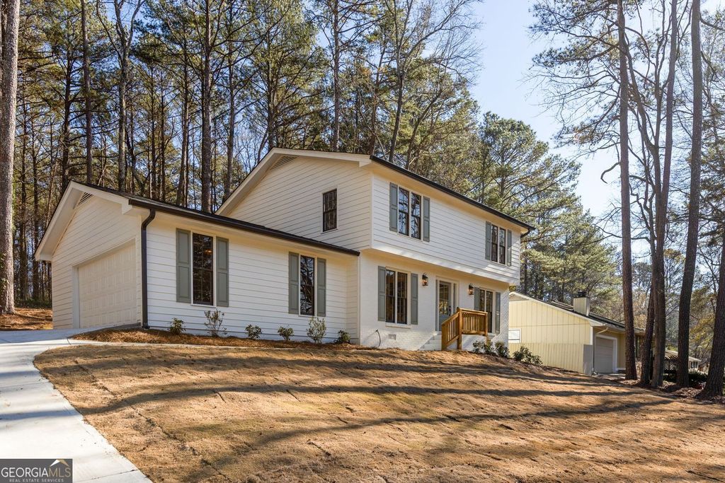 Photo of 1966 S Hidden Hills Parkway, Stone Mountain, GA 30088 (MLS # 10664985)