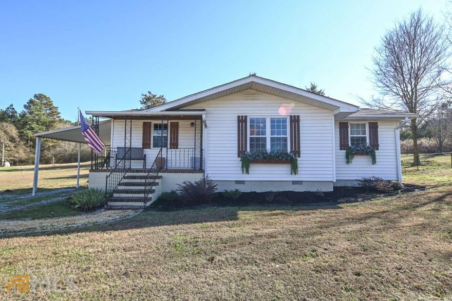 Don't miss this recently renovated 3-bedroom, 1-bath house situated on just a little over 2 acres in Madison County. The house has beautiful hardwood floors throughout that have been sanded and restained. The kitchen has been fully renovated and features new cabinets and countertops. Additional updates include bathroom, electrical panel with new wiring throughout, new plumbing, and new central heat and air. Outdoors you will find a covered porch and fenced in back yard.