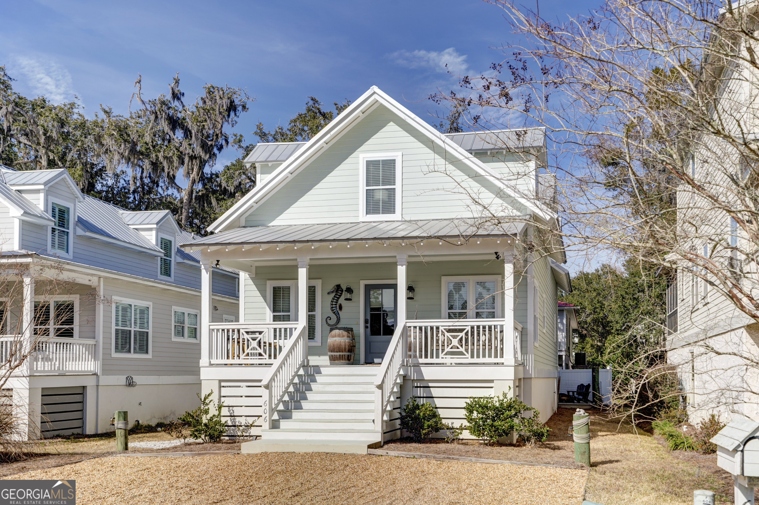 Mid-island convenience perfect for full-time, part-time or investment property. This 3 bedroom, 3.5 bathroom is currently being utilized as a short term rental. Furnishings are negotiable for those seeking to make a seamless transition into ownership. Built in 2017, this lovingly maintained home boasts all the modern amenities and upgrades including primary suite, laundry room and half bath on the main level. The second level does not disappoint with its additional living space and 2 more bedrooms each complete with an en suite bath. Outdoor living beckons from front porch sitting to back porch bonfires. Don't wait to make this one home! Seller is a licensed Realtor in the State of Georgia.