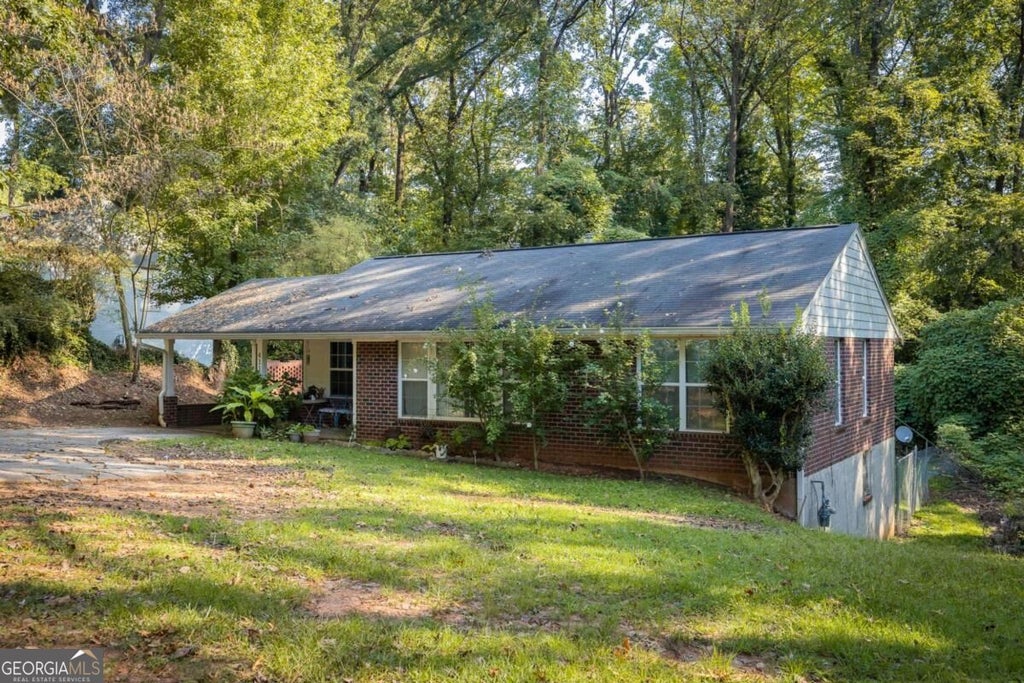 Photo of 4117 Ashford Dunwoody Road NE, Atlanta, GA 30319 (MLS # 10849179)