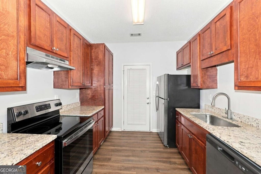 Photo of 8648 Thomas Lane, Riverdale, GA 30274 (MLS # 10836703)