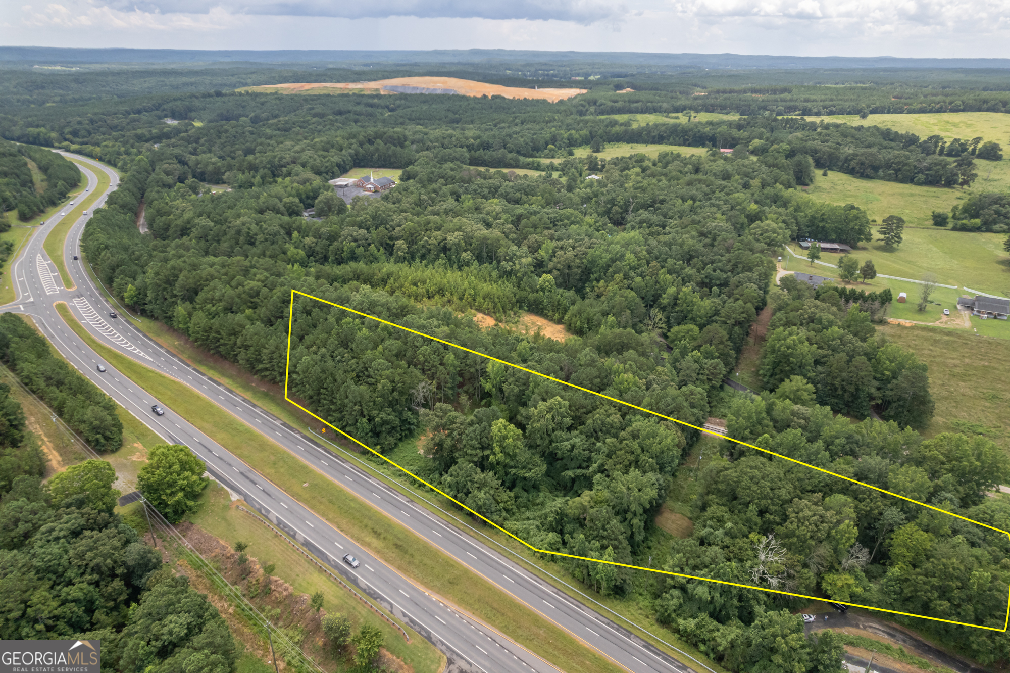 3.27 acres for sale! A home was previously on property but was removed. Prior property had septic, water, and electric. Conveniently located less than 2 miles from the local hospital, and between Rockmart and Cedartown, the property allows for quick access to the highway. Borders Hwy 278 but with driveway on Wimberly Hill Loop. Could be a great location for a new home site. Potential for commercial zoning but confirm with zoning department for eligibility during due diligence period. Tax records show 3.41 but current owner retained .24 acres bordering his property. Only property on east side of Wimberly Hill Loop will convey with the sale of this property which totals 3.27 acres. Boundary lines on pictures are estimated and do not represent actual property lines. Survey on file. Information deemed reliable but buyer to verify.