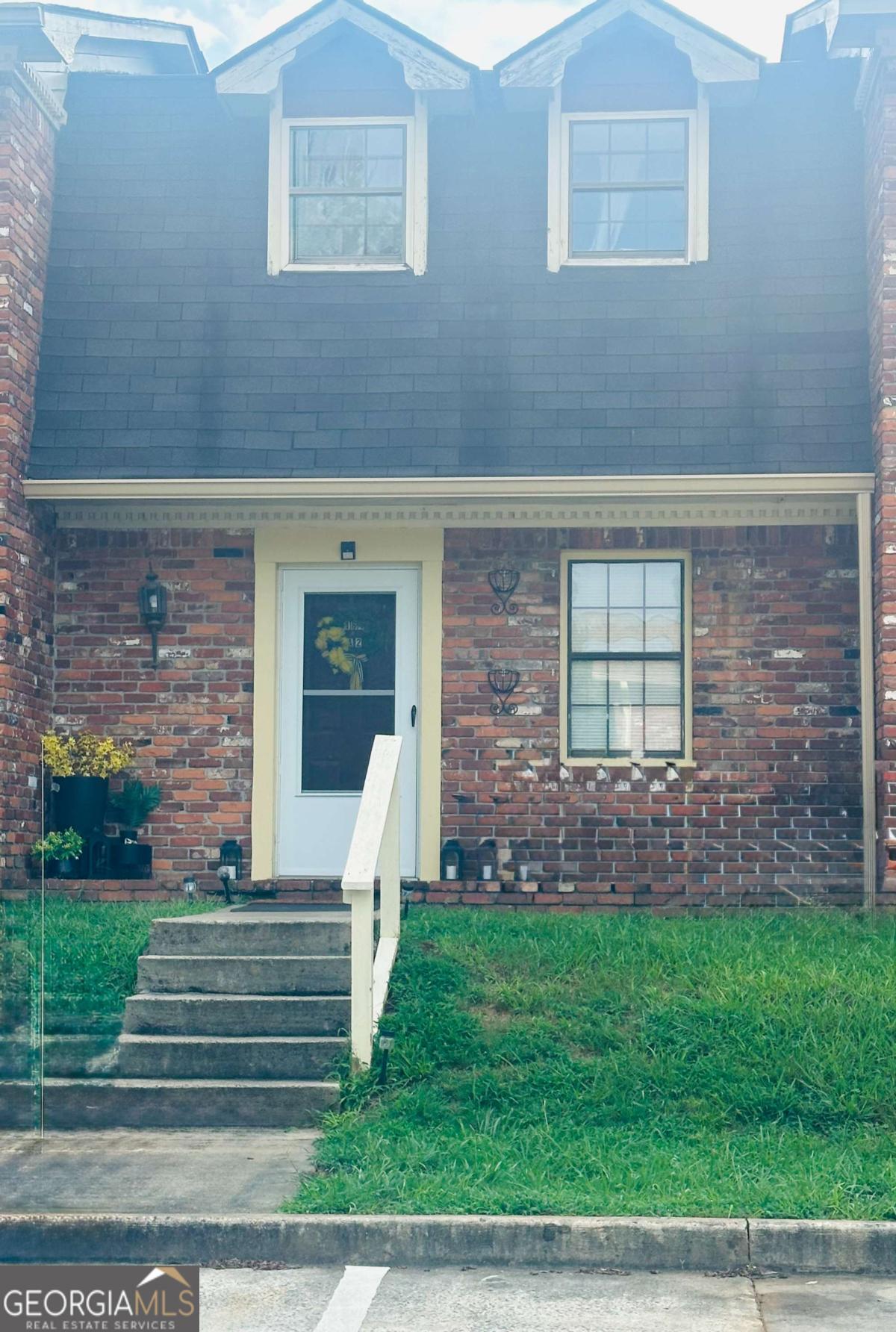 Welcome to this cozy 2-bedroom, 1.5 bathroom condo, located in the heart of Rome, Georgia, at 164 E 11th Rome Georgia. Perfect for anyone seeking a comfortable and convenient lifestyle, this property offers a peaceful retreat while being just minutes away from all the excitement downtown Rome has to offer. Located just a short walk from downtown Rome, this condo allows you to enjoy the many shops, restaurants, and cultural attractions of the city, including the charming Broad Street. Whether you're looking for a cozy cafe, local boutiques, or lively entertainment, everything is within walking distance. Schedule your showing today!