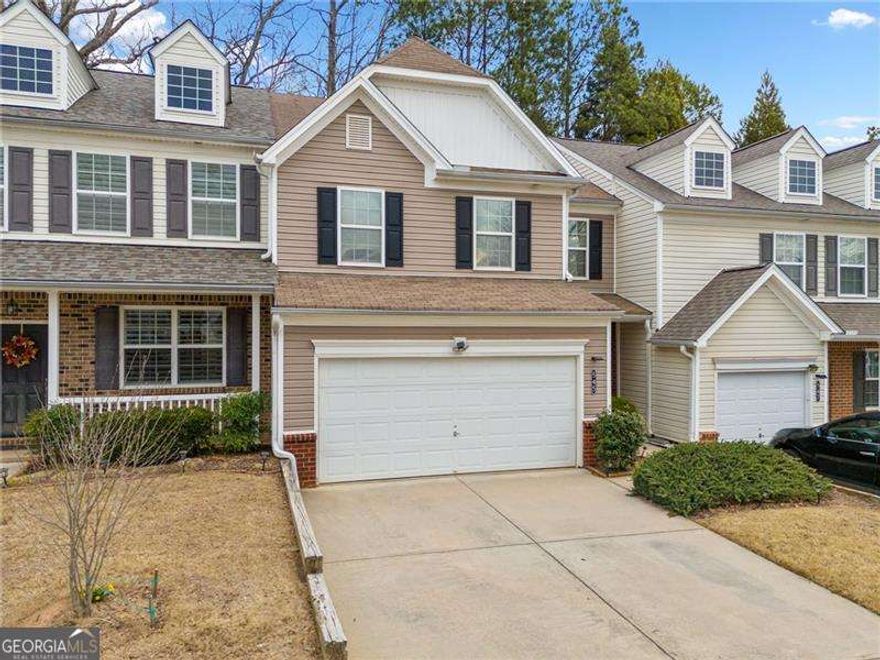 Seller offering $3,000 lender credit with acceptable offer via preferred lender Thomas Cady - Onward Home Mortgage - 770-298-1198 NMLS: 1017319. Discover this impeccably maintained townhome in the sought-after Weatherstone community, featuring a thoughtfully reimagined floor plan. The main level offers sleek tile flooring and an open-concept design, ideal for entertaining. The expanded kitchen showcases a unique layout with a removed wall, creating a more spacious environment. Quartz countertops, new cabinetry, stylish fixtures, and stainless steel appliances come together to form a kitchen that's both beautiful and functional. Upstairs, the oversized primary suite offers a serene retreat with a generous walk-in closet. Two additional bedrooms provide ample space for family or guests, and the convenient upper-level laundry room makes everyday tasks easier. Step outside to a private patio that overlooks a tranquil backyard - perfect for grilling, entertaining, or playing with your furry friends. Residents of Weatherstone enjoy access to a lovely neighborhood pool, and the prime location is just minutes from GA-400 and Halcyon. Outdoor enthusiasts will appreciate the easy access to Big Creek Greenway and Fowler Park, featuring scenic trails, a dog park, and sports fields. With no rental restrictions, this property offers exceptional flexibility - perfect for investors seeking strong returns or homebuyers looking for future income potential. Don't miss the opportunity to own this one-of-a-kind home in a fantastic location!