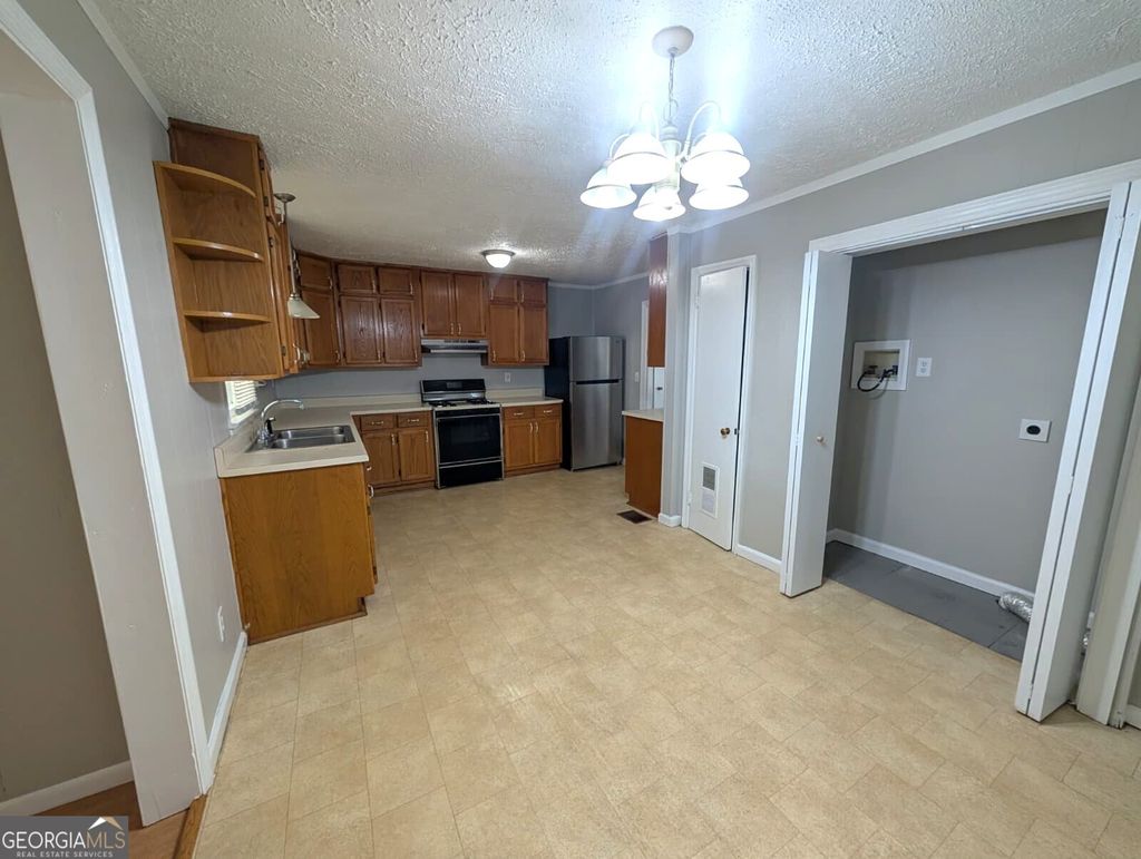 Photo of 218 Wallis Street, Jonesboro, GA 30236 (MLS # 10763847)