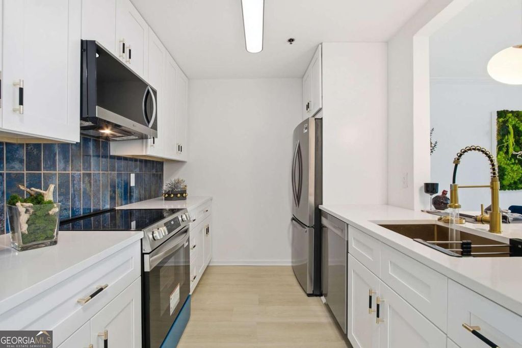 Photo of 970 Sidney Marcus Boulevard NE #2203, Atlanta, GA 30324 (MLS # 10756100)