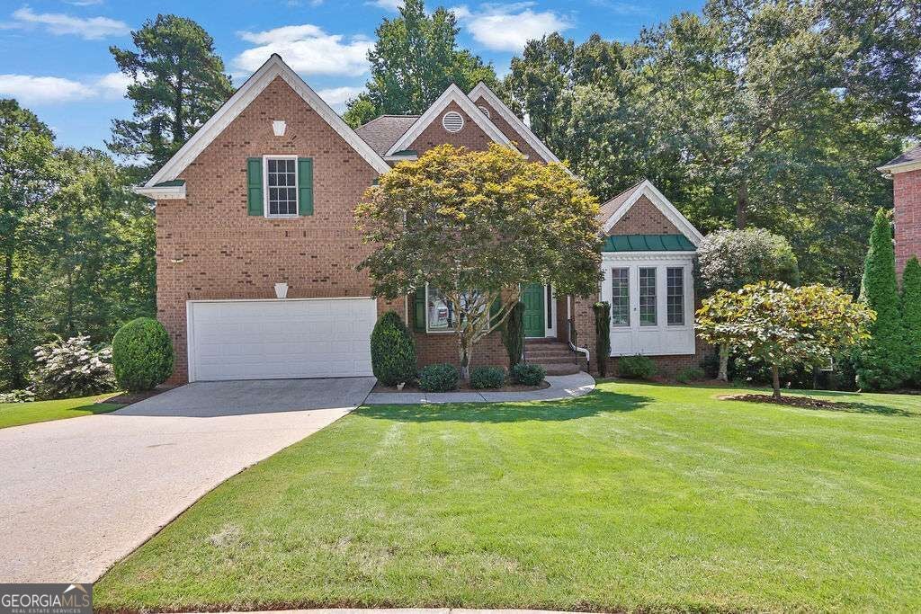 Photo of 3760 Colonial Trail SW, Lilburn, GA 30047 (MLS # 10847405)