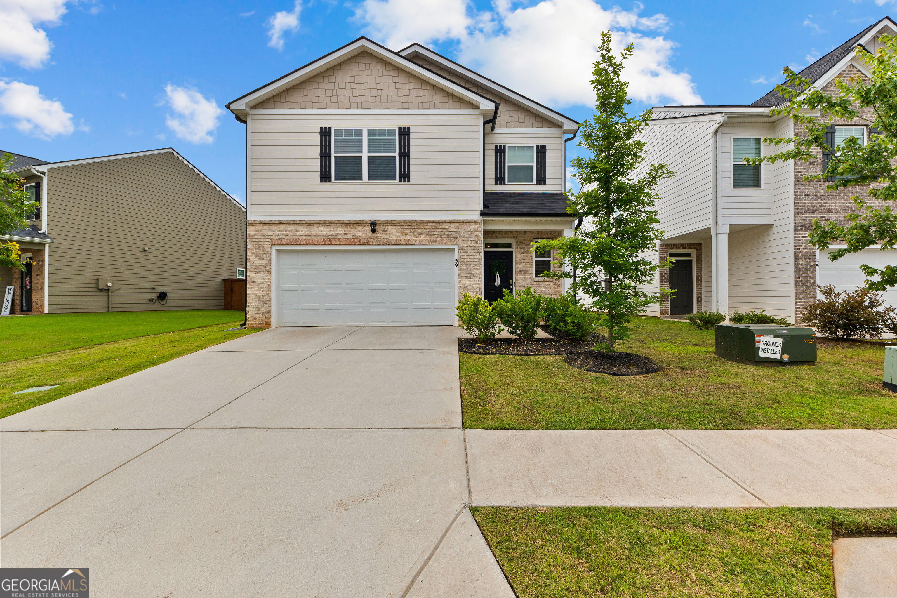 Welcome to this beautifully maintained 2-story home featuring 3 spacious bedrooms and 2.5 bathrooms. Step inside to an open-concept main floor filled with natural light, perfect for entertaining or relaxing at home. The kitchen boasts abundant cabinetry, a walk-in pantry, and a functional layout that flows seamlessly into the living and dining areas. Upstairs, you'll find a generously sized primary suite complete with a large walk-in closet and a luxurious walk-in shower. The laundry room is conveniently located on the second floor near all bedrooms, making everyday living a breeze. You are only steps away from a community pool & park to add enjoyment to your everyday life. Located less than 2 miles from local dining and medical facilities, with quick access to I-85-just minutes to Atlanta and surrounding cities. This home offers the perfect balance of comfort, convenience, and location!