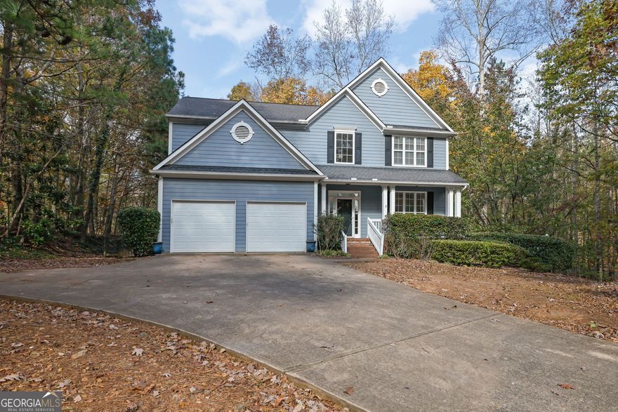 Nestled on over an acre in the sought-after Sable Pointe community in Milton, this spacious home offers peaceful privacy and stunning forest views. Inside, you'll find newly refinished hardwood floors, fresh paint, new carpet, and a kitchen boasting stainless steel appliances, granite countertops, a new range, and new built-in microwave. The kitchen opens to a large family room with a fireplace, perfect for entertaining. Upstairs features the master suite and three  large secondary bedrooms, as well as the laundry room. Enjoy the fully finished basement with another family room, kitchenette, full bathroom, bedroom and office space. Outside, enjoy the private backyard with a spacious deck and patio below. Top rated schools make this a home you don't want to miss!