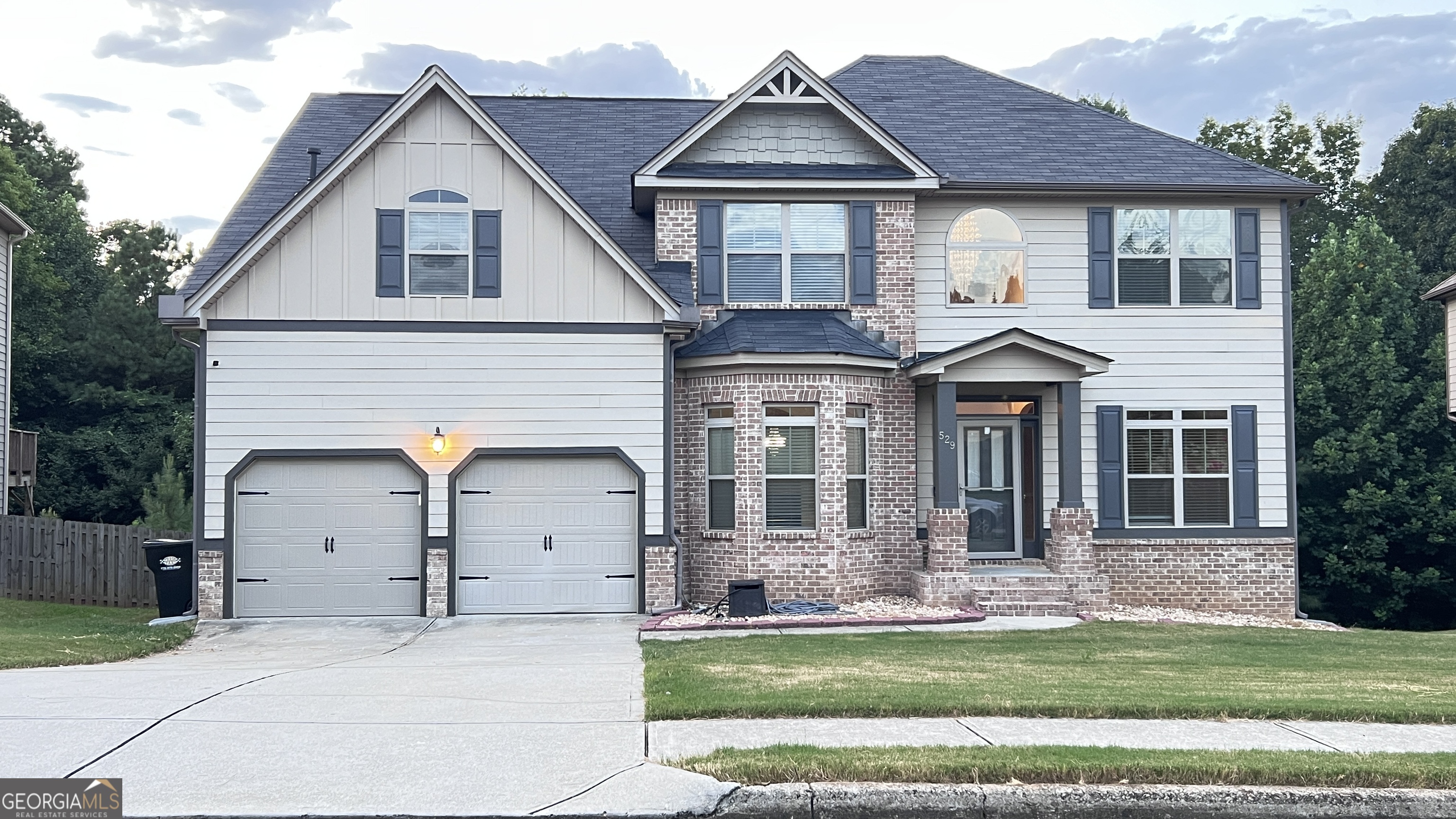 5 BEDROOMS - 3 BATHROOMS - 3,007 SQ FT - FULL STUDDED UNFINISHED BASEMENT - BUILT IN 2016 - 0.25 ACRE LOT - GRANITE COUNTERTOPS - DOUBLE OVENS - GAS COOKTOP - COFFERED CEILINGS - FORMAL DINING ROOM - FLEX/OFFICE SPACE - PRIMARY SUITE WITH SITTING AREA - WALK-IN CLOSETS - SOAKING TUB - SEPARATE SHOWER - GUEST SUITE ON MAIN LEVEL - OVERSIZED BACK DECK - LEVEL BACKYARD - WOOD-BACKED PRIVACY - COMMUNITY POOL - TENNIS COURTS - CLUBHOUSE - NORTH PAULDING HIGH SCHOOL DISTRICT Welcome Home to 529 Red Fox Drive - Where Comfort Meets Elegance Nestled in the sought-after Crossings at The Timberlands community, this spacious five-bedroom, three-bathroom home offers over 3,000 square feet of beautifully designed living space. Built in 2016, it seamlessly blends modern elegance with everyday comfort, making it perfect for families, remote professionals, or anyone craving room to grow and entertain. The main level welcomes you with coffered ceilings, detailed wainscoting, and an open floor plan filled with natural light. A formal dining room and separate flex space provide room for hosting or working from home. The heart of the home is the chef-style kitchen, complete with granite countertops, a large center island, gas cooktop, double ovens, and an inviting breakfast area that flows into the cozy living room featuring a gas-log fireplace. Downstairs also features a private guest bedroom and full bath, ideal for multigenerational living or out-of-town visitors. Upstairs, the primary suite is a true retreat with a spacious sitting area, oversized walk-in closet, and spa-inspired bathroom with double vanities, a soaking tub, and separate shower. Three additional bedrooms, another full bath, and a laundry room complete the upper level. Step outside to enjoy an oversized deck overlooking a level backyard bordered by wooded privacy-perfect for relaxing, entertaining, or letting the kids and pets play freely. Full unfinished basement is studded and ready to be finished. Offers multiple layouts for additional living space. The possibilities are endless. Community amenities include a swimming pool, tennis courts, and a clubhouse. Located just minutes from local schools, shopping, and dining, this move-in ready home offers the best of Paulding County living. Schedule your showing today and experience everything this exceptional home has to offer.