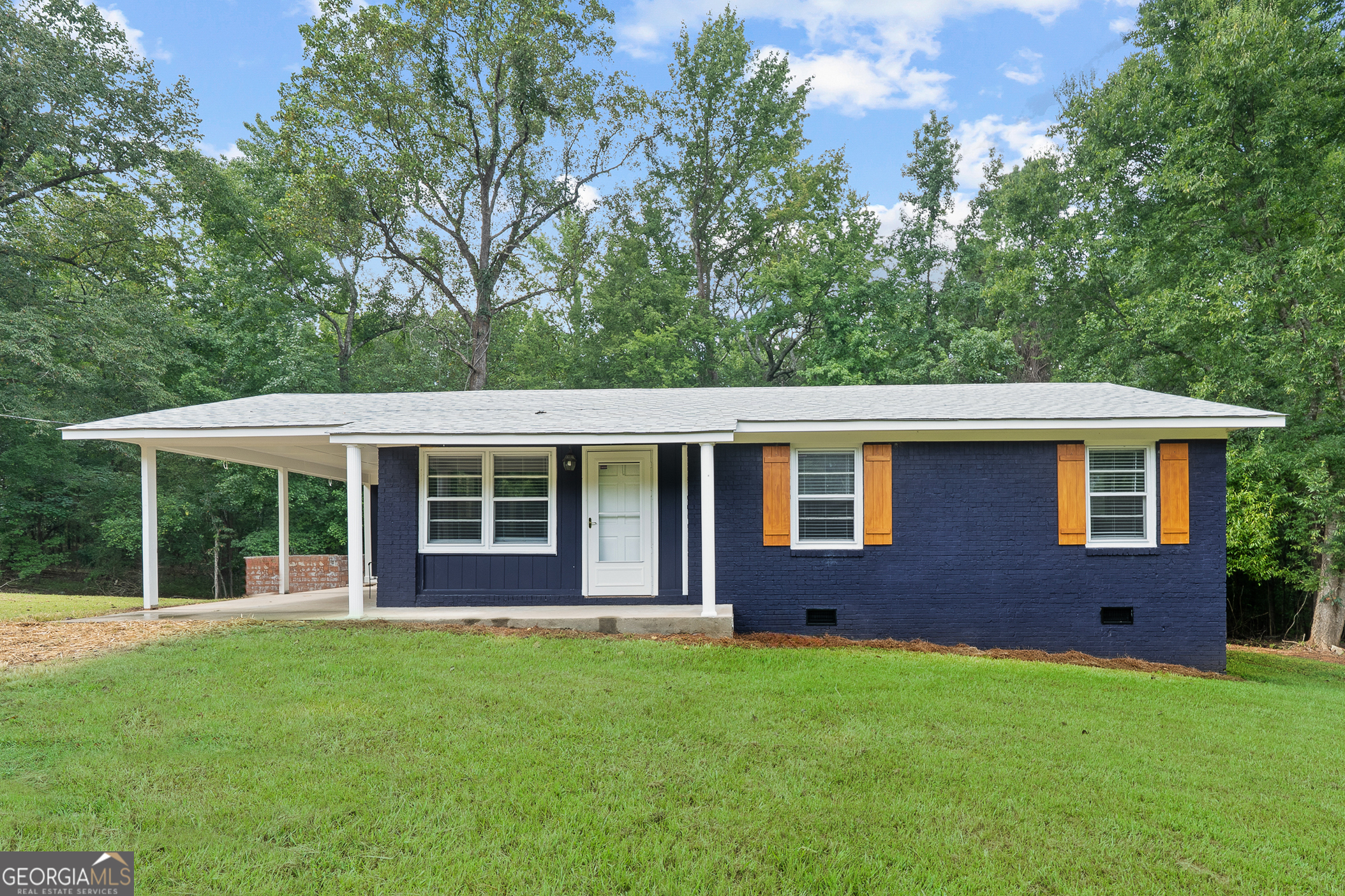 This beautifully renovated all brick ranch home is move-in ready and waiting for you! Featuring 3 bedrooms and 1.5 bathrooms, this home blends modern updates with timeless charm. The house has been freshly painted inside and out and a new roof has been installed. It features new LVP flooring in the common areas and original oak hardwood floors in the bedrooms. Bathrooms have been upgraded. All stainless steel kitchen appliances will convey with the sale. Home is total electric. Enjoy your morning coffee or unwind in the evening on the spacious back deck which overlooks the private 1.28 acre lot...this is the perfect spot for peaceful country living. There is also a partially finished outbuilding offering potential for additional storage or future workspace. Drilled well. NO HOAs. **HOME IS NOT FOR RENT. SELLER WILL NOT CONSIDER ANY OWNER FINANCING OR LEASE PURCHASE OFFERS.**