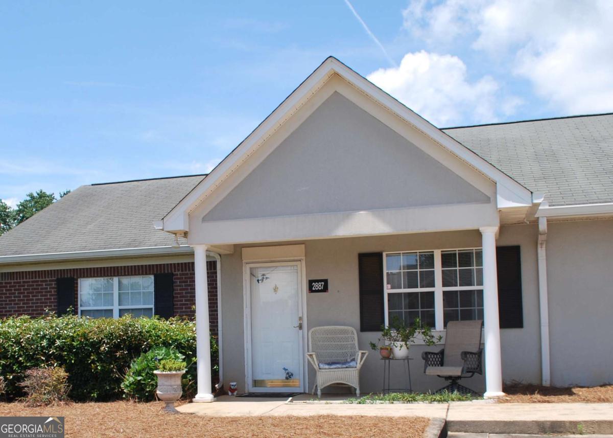 PRICE REFRESHER!! There's exciting news in Gainesville, Ga. Richmond Gardens finally has a condo available and it is priced to sell BELOW market value! Welcome to easy living in this beautifully maintained 2-bedroom, 2-bath single story condo, perfectly located on a desirable corner lot with ample green space for added privacy and relaxation. Inside, you'll be welcomed by vaulted ceilings that create an open, airy atmosphere along with LVP flooring throughout. Both bedrooms are generously sized, offering plenty of space for comfort and flexibility. The primary suite features a renovated and bathroom with modern finishes, while the second full bath is equally spacious and conveniently located for guests or family. Did I mention that there are NO STAIRS? This well-kept community offers a sparkling pool and clubhouse-perfect for relaxing weekends or hosting gatherings. Whether you're looking for your first home or a downsized lifestyle, this condo checks all the boxes with comfort, convenience, and community.