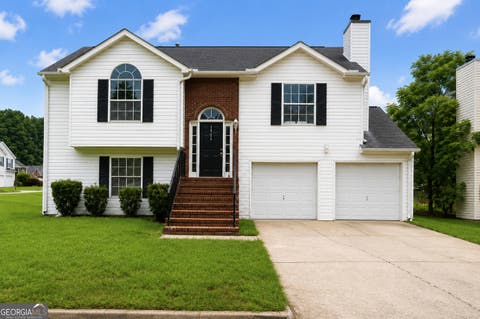 Photo of 5706 Hidden Brook Circle, Atlanta, GA 30349 (MLS # 10815091)
