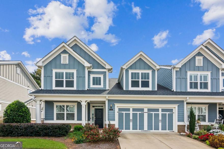 Spacious elegance meets easy living in this rare end-unit gem!  Welcome to one of the largest homes in the community, boasting over 3,100 sq. ft. of beautifully designed living space-including a finished terrace level-perfectly suited for comfort, style, and flexibility.  This impressive master-on-main residence is ideally positioned as an end unit, offering additional privacy and natural light throughout. The open-concept layout flows seamlessly from a gourmet kitchen-complete with stone countertops, white cabinetry, and a panoramic view into the fireside family room, including a generous dining area that's ideal for hosting gatherings. Step out onto your screened porch for morning coffee or unwind on the extended lower-level patio surrounded by professionally landscaped grounds.  With the HOA covering grounds maintenance, structural maintenance , pest control and top-tier amenities, you can truly enjoy living without worry. The main-level primary suite offers two large closets, a dual vanity, and a walk-in shower-your personal retreat awaits. An additional bedroom and full bath on the main level make hosting guests easy and convenient.  Upstairs, you'll find a large loft area-perfect as a media room or second living space-plus a third bedroom, full bath, and dedicated office area for remote work or hobbies. The fully finished terrace level is a spacious family room and two private bedrooms, and a covered patio with backyard access-ideal for multi-generational living or entertaining. Nestled in a thriving active adult community, enjoy privacy while still participating in neighborhood events, social gatherings, and amenities. Just minutes from dining, shopping, Northside Cherokee Hospital, and leading medical professionals.