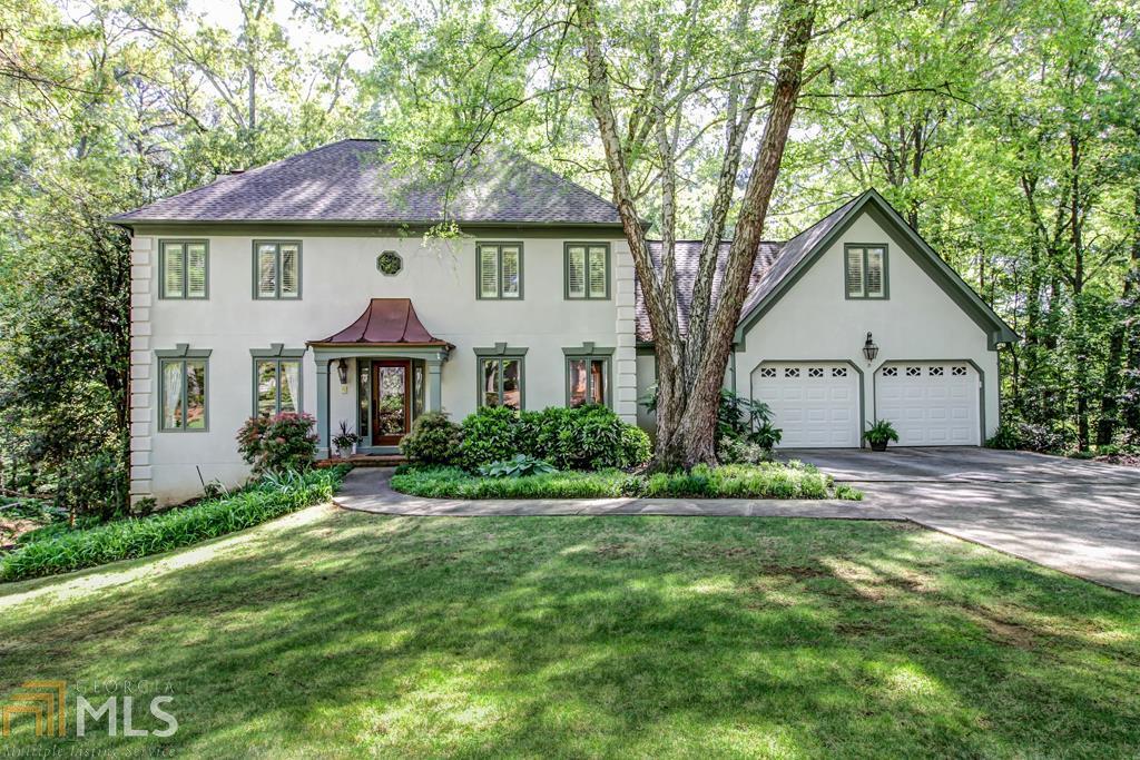Renovated Sibley Forest traditional. Hardcoat stucco larger than appears with 4 large bedrooms up and full finished basement. Amazing master renovation with his/hers closets & coffee bar in bathroom. Chef's kitchen with awesome cabinetry, hidden desk, plus Wolf stove top, SubZero and granite counters. Soaring Greatroom with skylights overlooking magical yard. Wet bar in great rm and in family rm on lower level. 2nd kitchen on lower level also. Plenty of space down for additional bedroom, game room or exercise room. Perfect entertaining deck overlooking quiet yard.