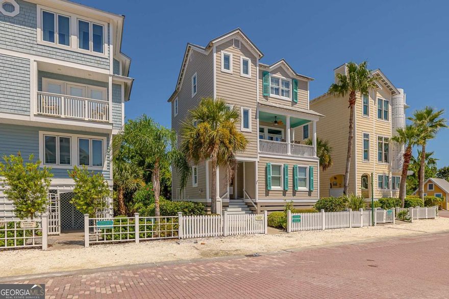 Ocean Views, Beachside Bliss, and Coastal Charm!         Ocean Views, Beach Adjacent, Charming and Darling-what more can one ask for!! Experience the best of island living in this stunning 3-bedroom, 3.5-bath residence designed for comfort, convenience, and camaraderie. Spanning three floors and complete with a private elevator, this home offers seamless access to every level.    On the first floor you'll find 2 bedrooms each with an ensuite bath, sold completely furnished    The second floor is the primary living area, and it is the stuff island dreams are made of. Featuring an open kitchen, dining and living room with abundant natural light.    Breathtaking views from the front porch (feel the ocean breeze and catch a glimpse of the waves from an ideal vantage point), where you can have a morning coffee or a relaxing evening enjoying a beautiful sunset and a cocktail.    Completely dedicated to the primary suite, the 3rd floor there is amble room for a private office space with water views. There is also a private balcony for those late nights.    Located in Coast Cottages at Saint Simons a great community, with 2 community pools and within 100 yards from the sand and you'll have your toes in the ocean within minutes.     This home also has a successful rental history through VRBO and Airbnb!    Just 5 minutes away, you'll find the vibrant St. Simons Village, home to local favorites like Brogen's, The Half Shell, Georgia Sea Grill, plus charming shops, bars, and boutiques.    Whether you're seeking a full-time residence or a coastal getaway, this home blends modern amenities with the relaxed charm of Saint Simons Island.