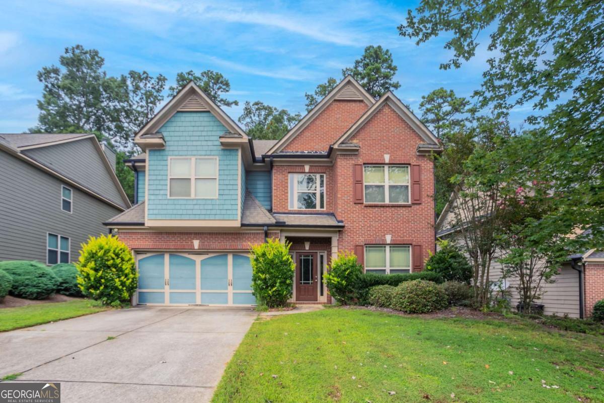 Beautiful two-story traditional home in the sought-after Sonoma Woods community. This residence offers a welcoming two-story foyer, a spacious great room with a cozy fireplace, and a chef's kitchen featuring granite countertops, a center island, hardwood floors, and a tile backsplash. The primary suite includes a sitting area, tray ceiling, and dual walk-in closets, while the spa-like bath boasts double vanities, a soaking tub, and a separate shower. Secondary bedrooms are connected with a convenient Jack-and-Jill bath. Outside, enjoy a covered patio perfect for relaxing or entertaining, along with a landscaped, level yard. Ideally located near Suwanee Town Center, shopping, dining, and top Gwinnett County schools, this home combines comfort, style, and convenience.