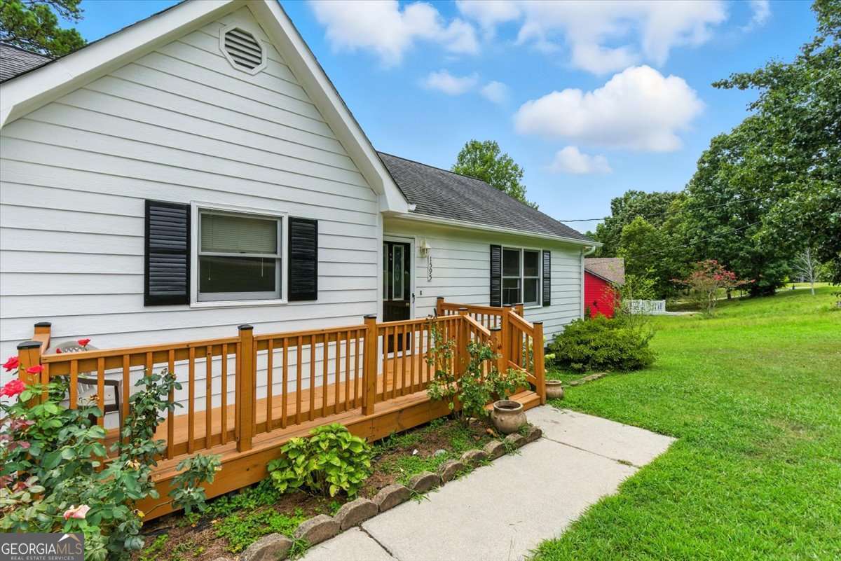 Welcome home to this well-maintained ranch offering convenience, comfort, and room to grow. Featuring a functional 2-bedroom, 2-bath layout, this home sits on a full unfinished basement-perfect for storage, a workshop, or future expansion. The bright and open living area flows into the kitchen and dining space, creating an inviting atmosphere. A 1-car garage provides secure parking, while the large fenced backyard offers privacy and plenty of space for pets, gardening, or outdoor entertaining. With no HOA, you'll enjoy the freedom to make this home truly your own. Conveniently between Cartersville and Rome. Located near shopping, dining, and major highways, this home is ready for its next owner!