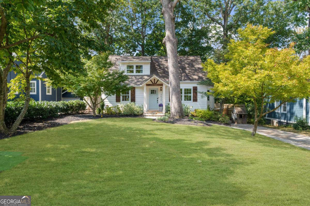 Welcome home to this beautifully updated property tucked away on a quiet cul-de-sac street in the highly coveted Keswick Village neighborhood, right in the heart of Chamblee. This 3-bedroom, 2-bathroom residence offers a perfect blend of luxury, comfort, and functionality and is the definition of turnkey, featuring FRESH interior paint, NEW carpet upstairs, NEW lighting, NEWER roof, NEWER double pane windows, NEWER A/C system, and NEWER sewer line to street, giving you peace of mind and worry-free living! As you enter the front door, you'll be greeted by gorgeous hardwood floors throughout the main level and a multi-purpose living room that's perfect for entertaining, watching tv, setting up a home office, curling up to a book by the windows, etc. At the heart of the home, the modern kitchen showcases stainless steel appliances, subway tile backsplash, soft-close cabinets, granite countertops, and a large island perfect for gathering. This open-concept space flows seamlessly into the family room, where a vaulted ceiling flanked with exposed beams and fireplace create a warm and inviting atmosphere. Rounding out the main floor are two spacious bedrooms and an updated hallway bathroom with a new vanity and a tiled tub/shower combo. Upstairs, you'll find the laundry closet, an oversized primary suite that contains his and hers closets (one is a walk-in), and a renovated ensuite bathroom, complete with a sizable double vanity, a huge glass-enclosed tiled walk-in shower, shiplap walls, updated lighting, and new mirrors. If you enjoy outdoor living space, then this is the home for you- French doors in the family room lead to an oversized deck overlooking the fenced-in private backyard, that's perfect for grilling out, hosting friends & family, enjoying s'mores by the firepit, or soaking up some rays. The large backyard is ideal for outdoor activities (cornhole anyone?) and features a garden shed for additional storage. The location of this home couldn't be better, as it's walking distance to Keswick Park, Blackburn Park, Chamblee Rail Trail, and many of Chamblee's top restaurants & retail destinations, in addition to being just minutes away from Chamblee's Downtown Entertainment District. Also easy access I-285, GA-400, Peachtree Industrial/Peachtree Blvd, and 141, making your work commute seamless. Schedule a viewing today and experience the lifestyle you've always dreamed of!