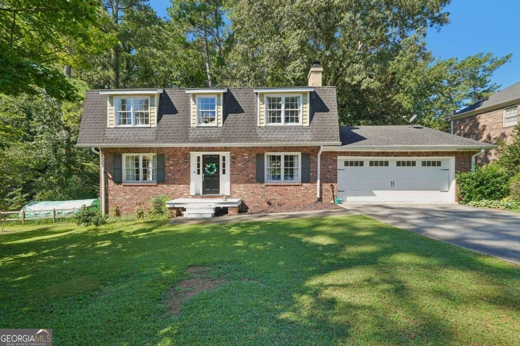 Photo of 585 James Street SW, Lilburn, GA 30047 (MLS # 10847019)