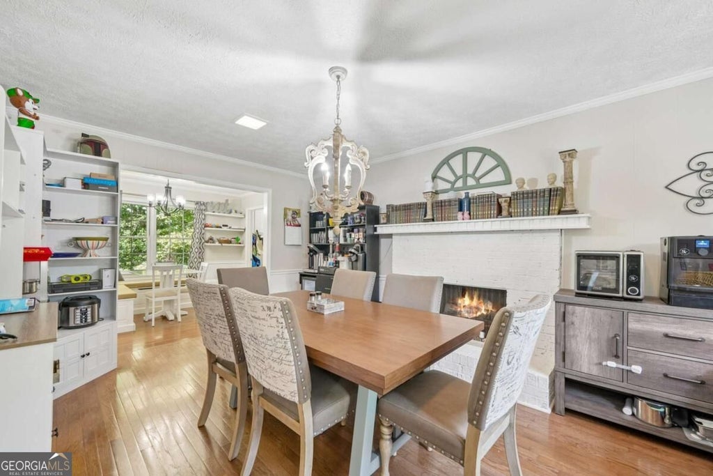 Photo of 585 James Street SW, Lilburn, GA 30047 (MLS # 10847019)
