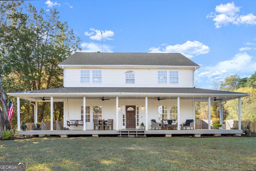 A Piece of History, Beautifully Reimagined Step into a piece of history with this beautiful updated farmhouse, where seamless craftsmanship meets modern luxury. Nestled on 0.7 acre, this 4-bedroom, 3.5-bath residence offers an exceptional blend of character, comfort, and contemporary convenience. A sprawling front porch welcomes you home spanning the full width of the house and offering the perfect spot to enjoy your morning coffee or unwind after a busy day. Inside, original details and warm wood tones pair seamlessly with thoughtful updates throughout. Two cozy wood-burning fireplaces create inviting spaces for gathering on cool nights. At the heart of the home lies a stunning newly-renovated kitchen, designed for both everyday living and entertaining. A chef's dream, it features a spacious island, apron-front farmhouse sink, double oven with 8 burners, and a 60-inch full-size refrigerator and freezer all complemented by abundant custom cabinetry. The main-level primary bedroom with a private ensuite offers flexibility for guests, a main level primary bedroom or serves perfectly as a dedicated home office. Upstairs, an additional primary bedroom and two secondary bedrooms provide space and comfort for family and friends alike. Step outside to your own private, fully fenced large backyard ideal for entertaining, gardening, or simply letting pets roam freely. There's room to relax, explore, and make memories that will last a lifetime. With its large lot, historic charm, and modern updates, this farmhouse offers a rare opportunity to own a true blend of heritage and modern living. Discover the perfect balance of past and present this remarkable property isn't just a home; it's a story waiting to be continued.