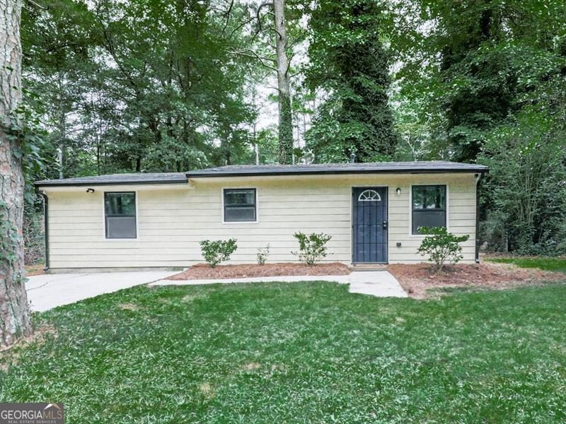 This beautifully updated property offers the perfect blend of comfort and convenience. The open-concept layout flows into a private master suite, 2 additional bedrooms, and a dedicated laundry room, making everyday living effortless. A stylish tiled bathroom adds a modern touch, and the outdoor shed provides extra storage. Less than 2 miles from the airport and walking distance to Skyes Park, where you'll enjoy access to tennis courts, playgrounds, and scenic biking trails right in your neighborhood. Whether you're starting fresh or expanding your portfolio, this home delivers location, livability, and lasting value.