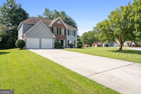 Photo of 6115 Riveroak Terrace, Atlanta, GA 30349 (MLS # 10585286)