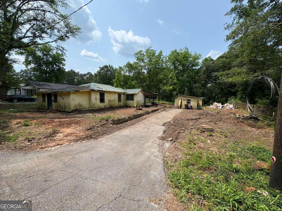 "Located at 3700 Moore Road in Austell, GA 30106, this investment property is a true diamond in the rough-an unpolished gem waiting for the right investor to unlock its full potential. Perfect for flippers, this home offers a fantastic opportunity to design and customize it any way you desire, turning a modest investment into a high-profit asset. The neighborhood provides a prime location with easy access to major routes like I-20 and Thornton Road, ensuring excellent connectivity for future buyers or renters. Nearby commercial spaces, shopping centers, and dining options add convenience and appeal, while Austell's growing real estate market boosts long-term value. With a little vision and strategic renovations, this property can shine bright-don't miss your chance to transform this hidden treasure into a lucrative flip!"