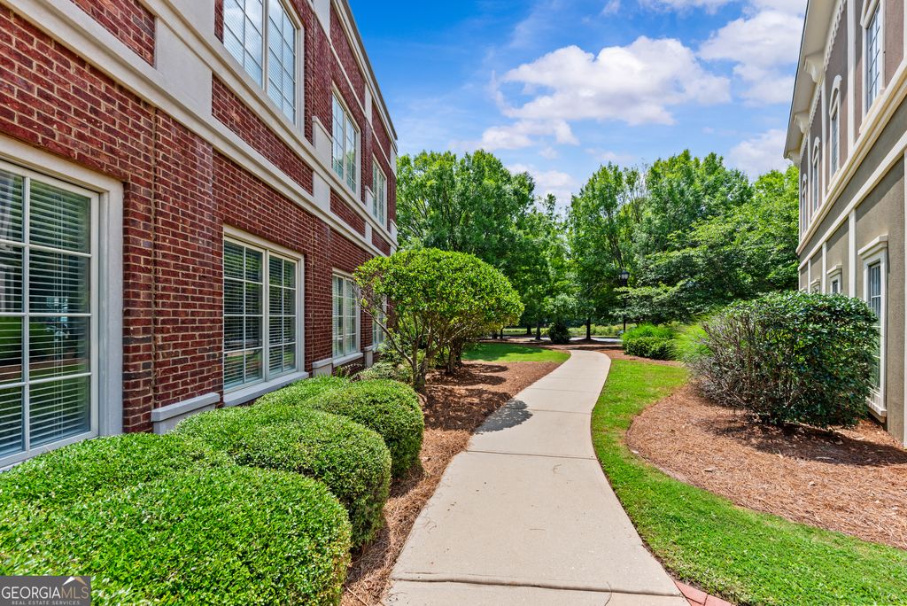Photo of 1041 Parkside Commons CMNS #101, Greensboro, GA 30642 (MLS # 10808474)