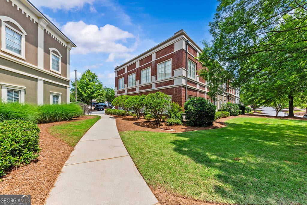 Photo of 1041 Parkside Commons CMNS #101, Greensboro, GA 30642 (MLS # 10808474)