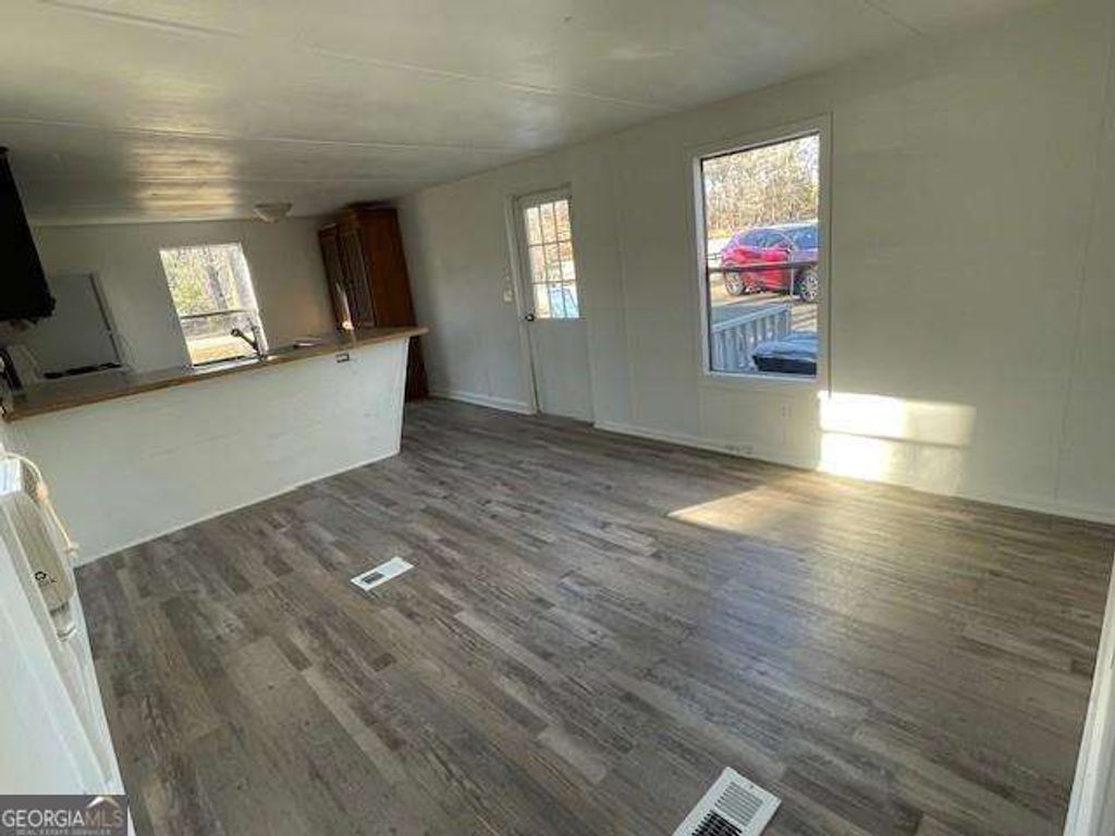 Photo of 1047 Island Ford Road, Buford, GA 30518 (MLS # 10711151)