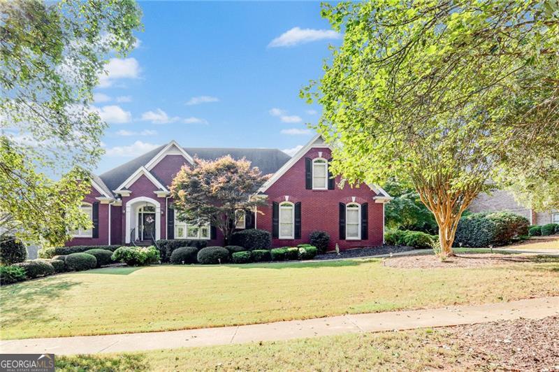 Welcome Home! Beautiful and spacious 4 bed 3.5 bath located in Monroe! This traditional-style home offers plenty of room! Inside, you'll find a separate dining room, an eat-in kitchen, a cozy living room with a fireplace, and laundry room. The primary suite is oversized and features a walk-in closet - the primary ensuite bathroom features double vanities, large shower, and a separate soaking tub. Finished basement adds tons of living space, perfect for home office, gym, movie room - or whatever you want it to be! The outside living area includes a screened in porch, and a covered patio off the basement that opens up to a large backyard. The community has a pool and tennis courts! Schedule your showing today!