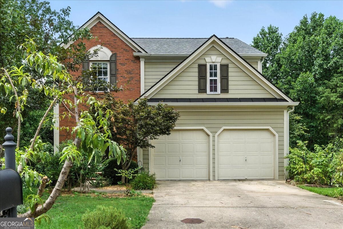 Welcome to this beautifully updated 4-bedroom, 3.5-bathroom home nestled on a quiet cul-de-sac in the heart of Milton, GA-zoned for the highly sought-after Cambridge High School. Sitting on a generously sized lot, this home offers a large, private backyard surrounded by mature trees and natural beauty, creating a peaceful outdoor retreat. This home is truly one of a kind, offering the perfect blend of charm, comfort, and functionality. Step inside to discover a thoughtfully remodeled floor plan featuring an open-concept kitchen with a large island, birch butcher block countertops with a waterproof finish, stainless steel appliances, and a seamless flow into the spacious living and dining areas-perfect for entertaining. A walk-in butler's pantry provides additional storage and prep space, making hosting a breeze. Enjoy mornings on the screened-in deck, which is equipped with fans, an infrared heater, and a gas line-perfect for grilling and outdoor entertaining. It overlooks a serene, private backyard that not only offers space and seclusion but also features a vibrant mix of fruit trees-including apple, pear, peach, apricot, plum, kiwi, fig, mulberry, cherry, pomegranate, grapevines, and an abundance of berries such as blueberries, strawberries, raspberries, and blackberries. You'll also find an ample selection of fresh herbs, making this a dream setting for any home chef or garden enthusiast -ideal for grilling and outdoor gatherings all year long. The finished basement offers a versatile space ideal for a media room, home gym, guest suite, or playroom-with a full bathroom for added convenience.