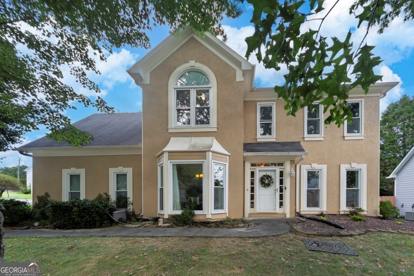Welcome to this beautifully updated 4 bedroom, 2.5 bathroom home on a corner lot in the heart of Johns Creek, located in a top-rated school district. Featuring a stucco exterior and numerous recent upgrades, this home is truly move-in ready. The bright two-story foyer leads to a formal living room, dining room, and a cozy family room that opens to the kitchen - perfect for everyday living. The kitchen overlooks the family room and leads directly to the fenced-in, level backyard, ideal for entertaining and outdoor enjoyment. Upstairs, the primary suite offers a fully renovated bathroom with modern finishes, along with three additional bedrooms and a shared full bath. Enjoy peace of mind with new luxury vinyl plank (LVP) flooring, new front and back doors, newer energy-efficient windows with a lifetime warranty, HVAC systems with a lifetime transferable warranty, a new water heater, and a newer electrical panel. All of this in a prime location, just minutes from Johns Creek's best restaurants, parks, shopping, and more, and only 8 minutes from Avalon and GA-400!