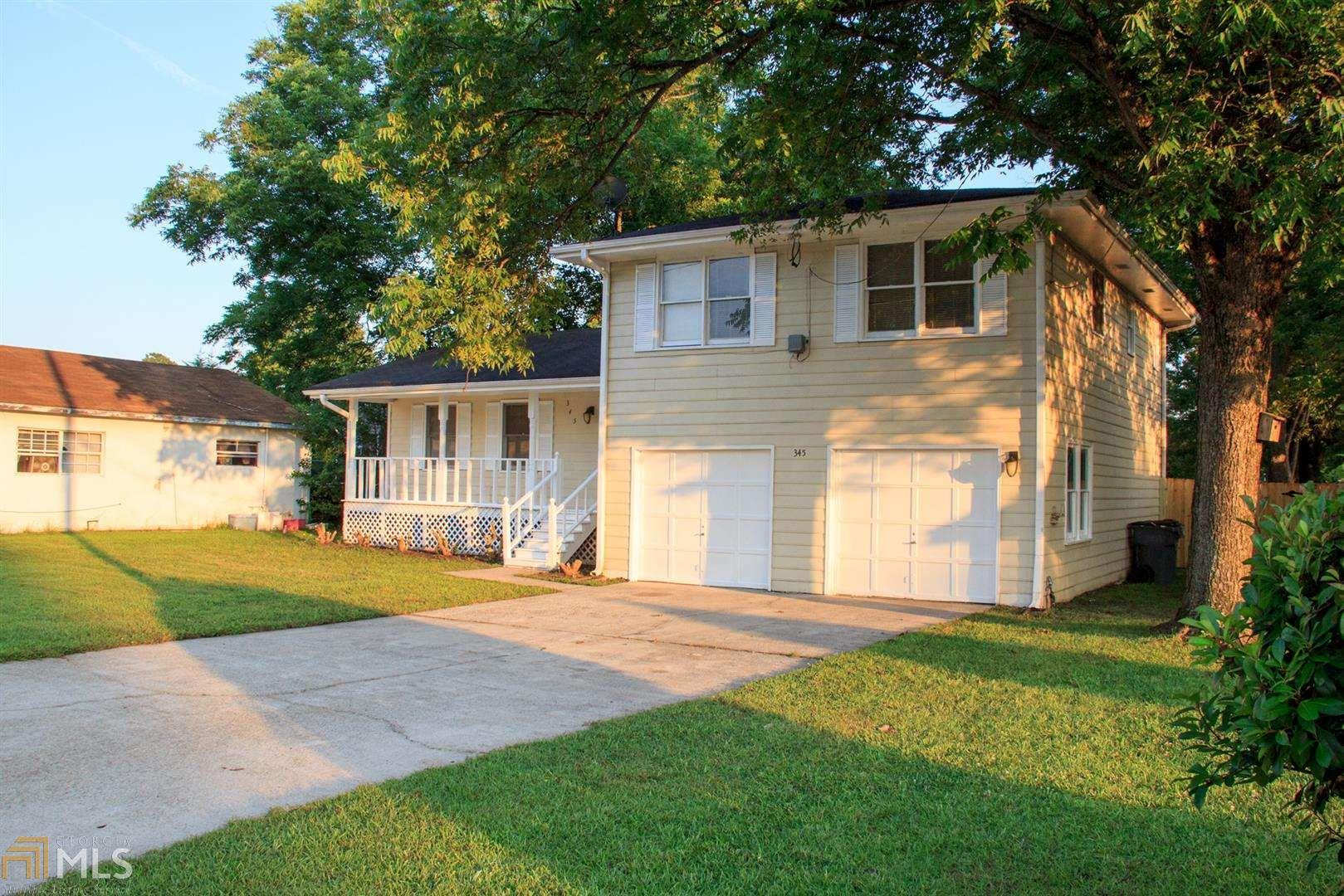 Are you looking for a fabulous home? Come see this one for sure! Fabulous split-level on a large lot, 3 bedroom, 2 full bathrooms, a large family room, a separate dining, a great kitchen, and the garage. There's an inviting front porch and a private back yard, perfect for entertaining. Fresh paint and new carpet throughout. Call today to make this home yours! Minutes for the McDonough Square.