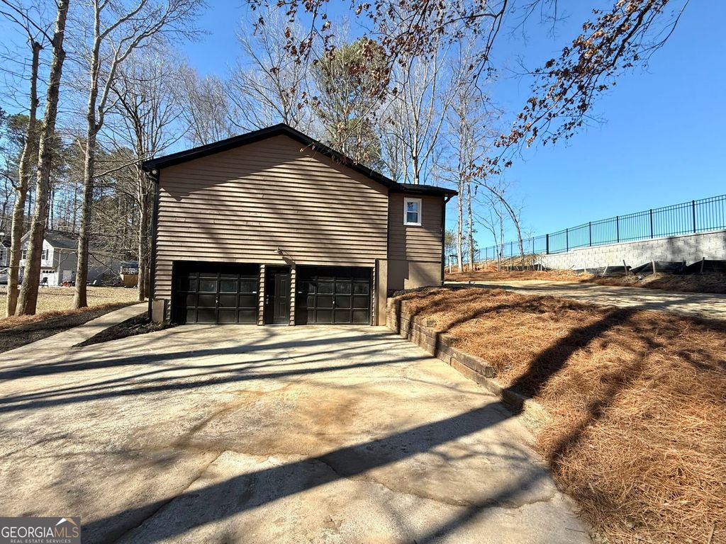 Photo of 3851 Riding Woods Court SW, Powder Springs, GA 30127 (MLS # 10686852)