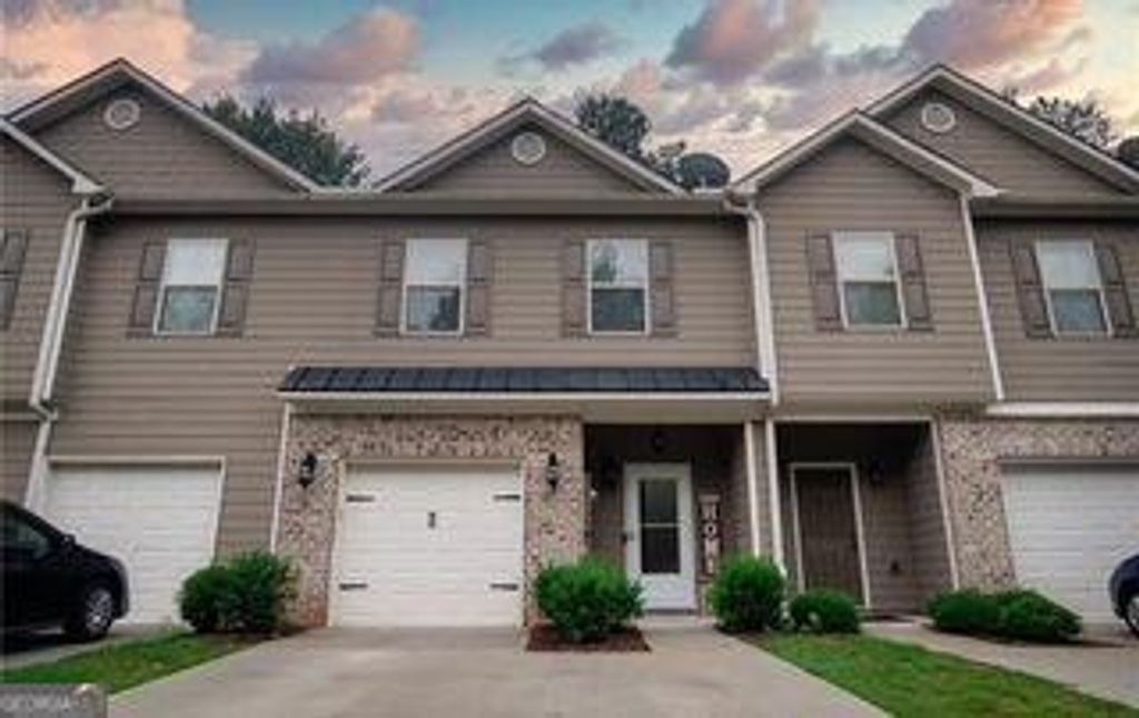 Photo of 5339 TIMBER HILLS Dr, Oakwood, GA 30566 (MLS # 10651530)