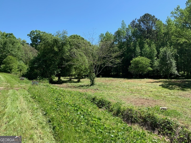 A wonderful opportunity to build your dream home in Oxford! - 1.36 acres - Well already in place!! - No HOA - A Beautiful Corner Lot with road frontage on two roads!! This residential lot is gorgeous with its Scenic creek view! The creek borders the right side of the property. This is a quiet, country setting that is conveniently located to Highway 138 & Highway 81. Don't miss this, come see this lot today!