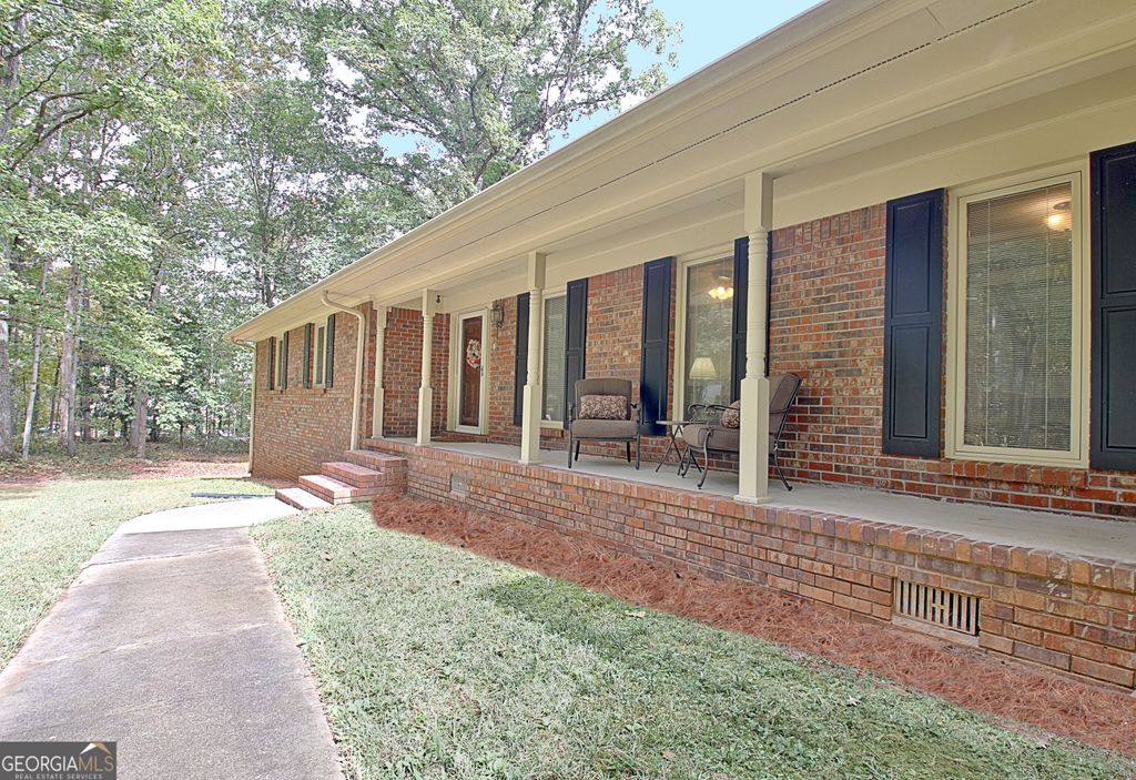 Photo of 120 WOODLAND Road, Fayetteville, GA 30214 (MLS # 10637249)